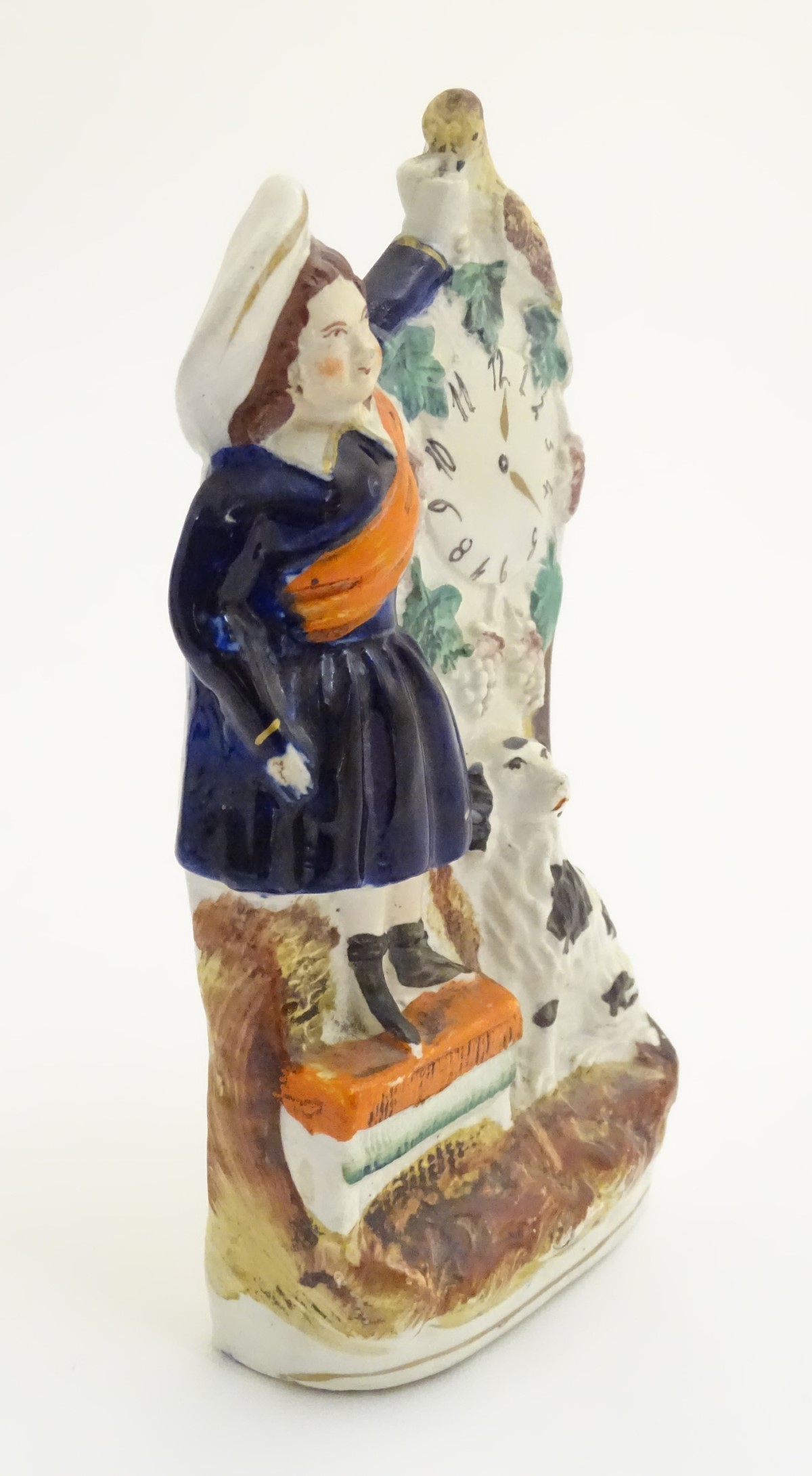 A Victorian Staffordshire pottery flatback model of a woman wearing a sash feeding a bird next to a - Image 5 of 6