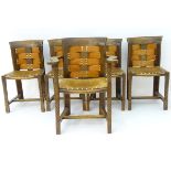 An early 20thC set of five oak Arts & Crafts chairs designed by 'George Henry Walton' with leather