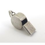 A novelty silver pendant charm formed as a whistle. Approx. 1/2" long.