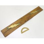 Vintage Tools: A boxwood and brass mounted parallel rule marked 'Capt.