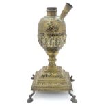 A late 19thC Indian brass hookah pipe base with black enamel and engraved scrolling foliate