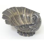 A Continental silver dish formed as a scallop shell.