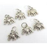 6 novelty white metal pendant charms formed as elephant.