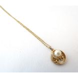 A 9ct gold pendant and chain, the pendant of circular form set with central pearl.