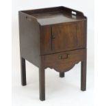 An early 19thC mahogany tray top nightstand,