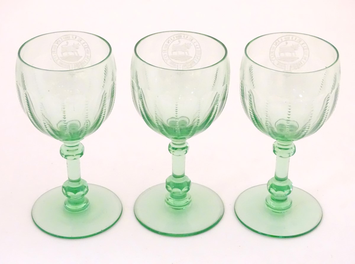 Three green glass pedestal wine glasses with engraved armorial depicting a bull and titled with - Image 5 of 8