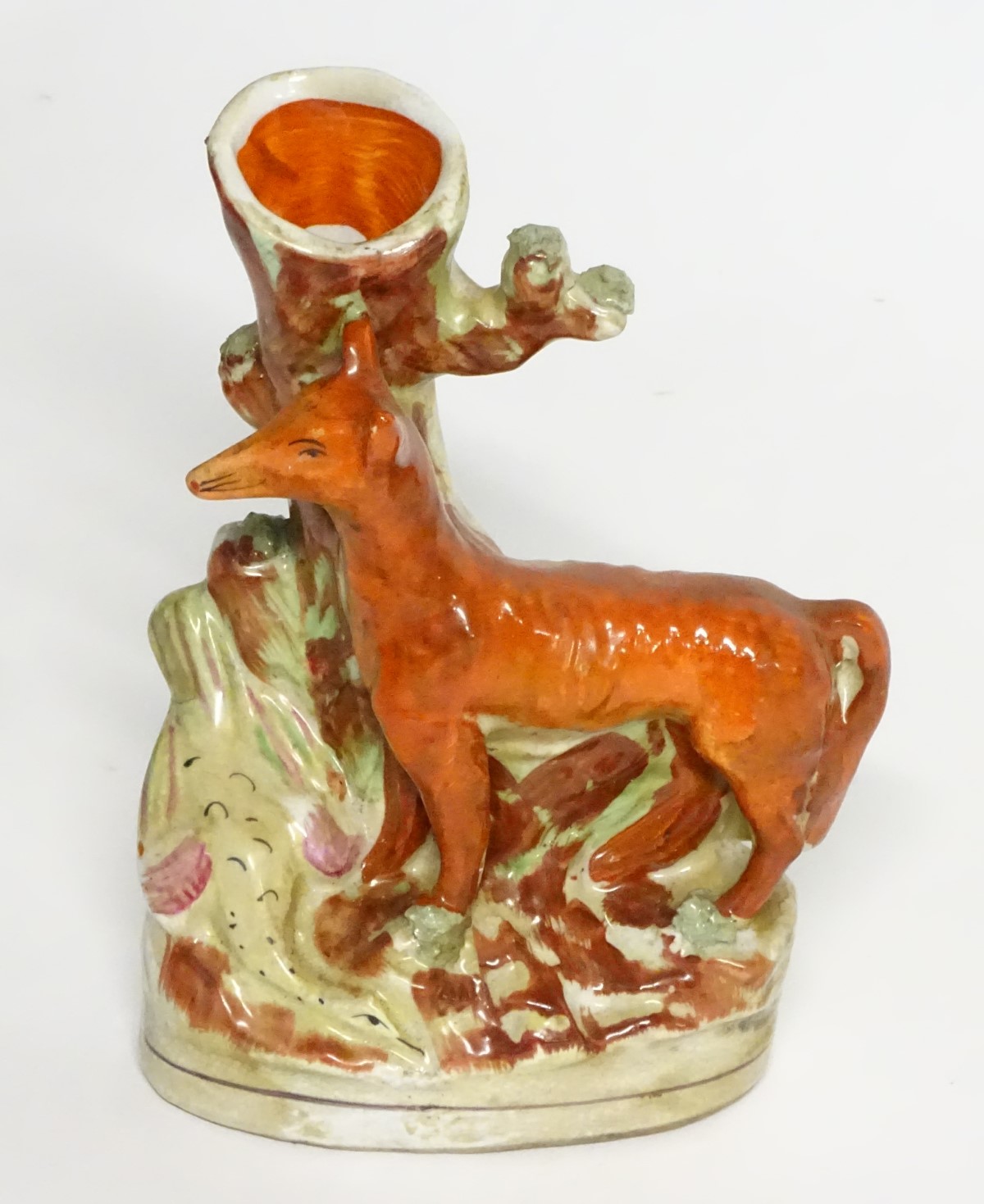 A Staffordshire flat backed fox and game bird spill vase, 8" high,