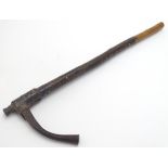 Native Tribal : an African hammer like club with leather bound metal end,