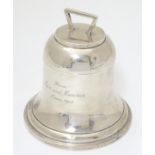 A silver inkwell of bell / capstone form with hinged lid.