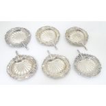 A set of 6 small dishes formed as fans with scallop, C-scroll and pierced decoration.