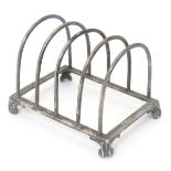 A silver 5-bar toast rack hallmarked Birmingham 1920 maker J B Chatterly & Sons Ltd.