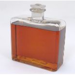 A rectangular glass scent / perfume bottle with canted corners and stopper.