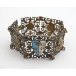 An early 20thC Continental gilt metal bracelet the pierced links decorated with pharaoh, crescent