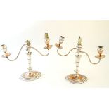 A pair of silver plated candelabra approx 12'' high Please Note - we do not make reference to the