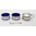 A pair of silver salts hallmarked Birmingham 1919 maker Gorham Manufacturing Co. together with an