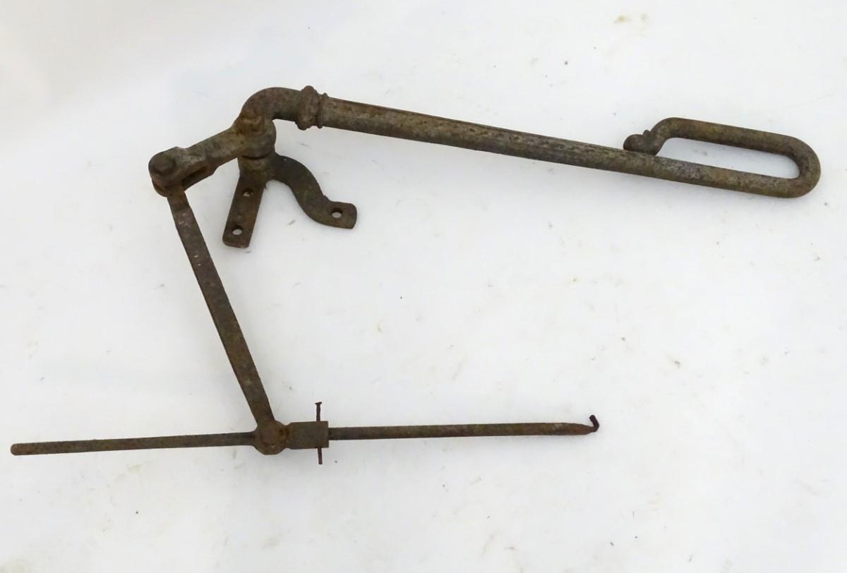Garden & Architectural: a Victorian cast iron water pump handle assembly, the neck with fuchsia