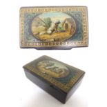 A 19thC papier mache snuff box with lacquered decoration with an oval depicting a dog in a