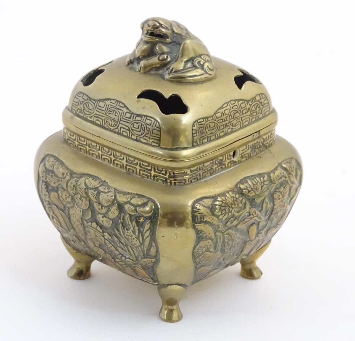A Chinese lidded cast brass censor of squat form with panelled foliate decoration to sides, raised - Image 5 of 6