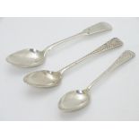 Three various Scottish silver teaspoons, two with bright cut decoration, one fiddle pattern.