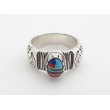 Native American Indian jewellery : A Silver ring in the Navajo style set with coloured cabobochon.