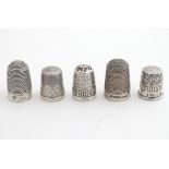 5 assorted thimbles including 4 silver examples. (5) Please Note - we do not make reference to the