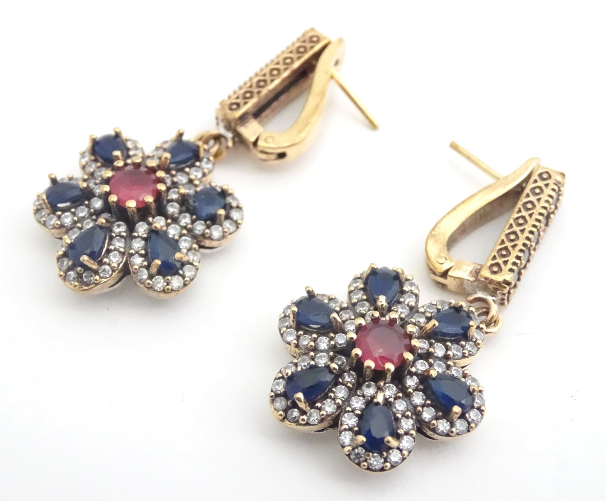 Silver drop earrings set with blue white and red paste stones in a daisy setting. Approx 1 3/4" long - Image 3 of 3