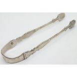 19thC silver sugar tongs, 5" long (36g) Please Note - we do not make reference to the condition of