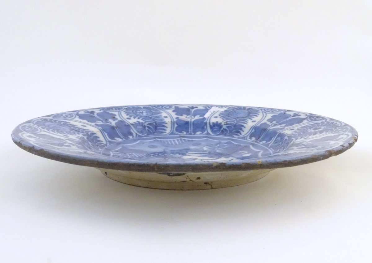 A blue and white Chinese Export Kraak style charger, with panelled decoration depicting stylised - Image 3 of 9