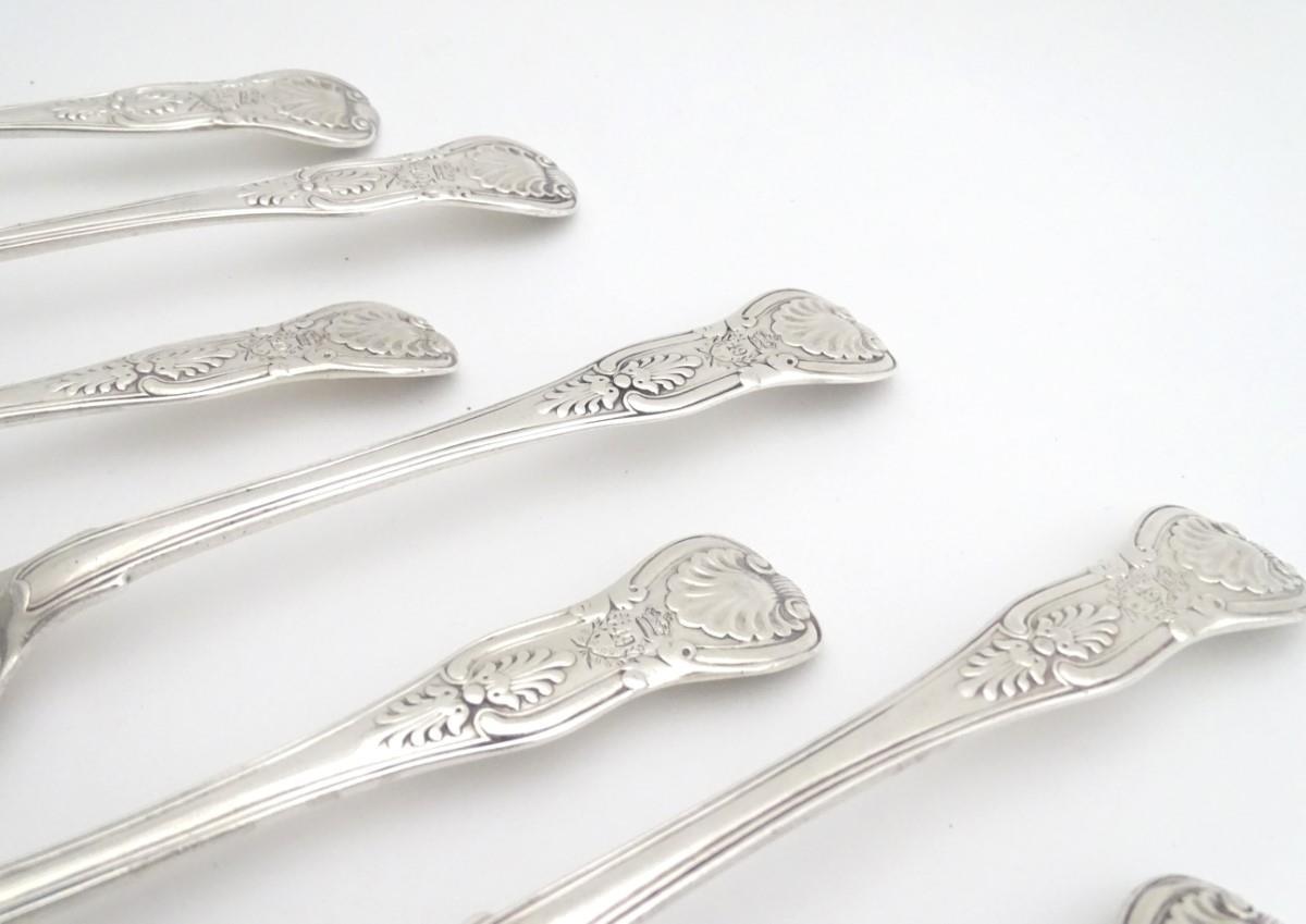 A set of 11 Geo IV silver kings pattern table spoons . Hallmarked London 1828 maker William - Image 10 of 15