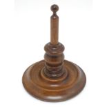 Treen : A 19thC turned wooden yarn stand with a circular base. Approx. 7 1/4" high. Please Note - we