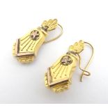 A pair of 19thC yellow metal drop earrings 1" long Please Note - we do not make reference to the