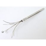 A retractable Sterling Silver swizzle stick Approx 3'' long closed Please Note - we do not make