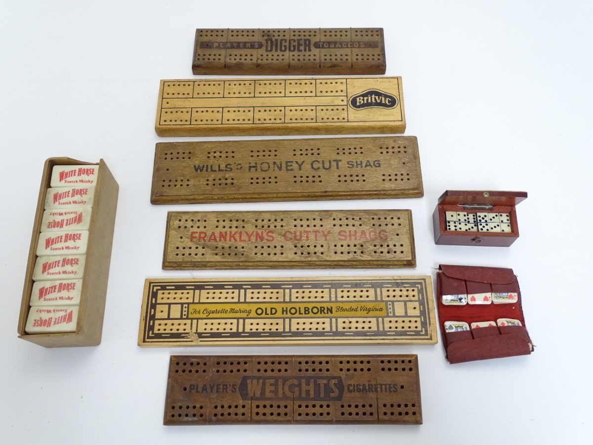 A set of advertising dominoes for White Horse whisky, together with a box of miniature bone