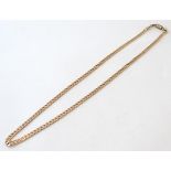 A 9ct gold flat curb link chain. Approx. 20'' long. (24g) Please Note - we do not make reference