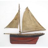 Toy: A wooden painted model boat / pond yacht with sails. Approx. 18 1/4" long. Please Note - we