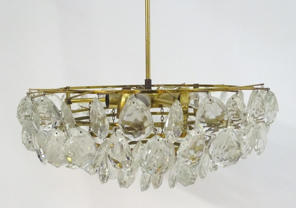 A mid 20thC Italian electrolier, having nine lights illuminating five tiers of glass droplets / - Image 4 of 7