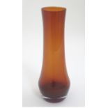 A retro red studio glass vase. Approx. 9 3/4'' high. Please Note - we do not make reference to the