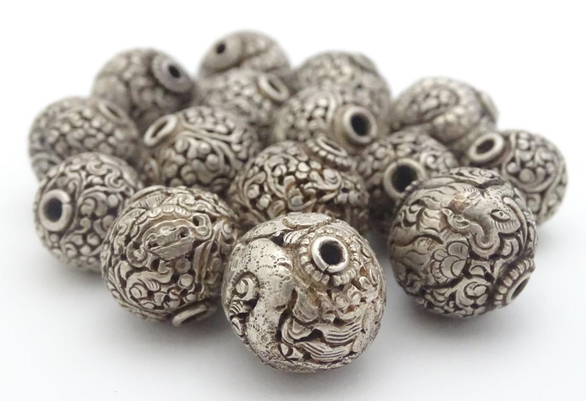 14 assorted white metal beads with various acanthus scroll and scrolling dragon decoration. The - Image 10 of 11
