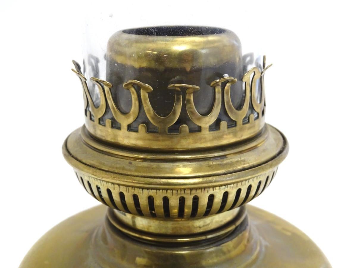 A Belgian c1930s Lempereur & Bernard oil lamp, the brass stand decorated with floral motifs and - Image 4 of 7