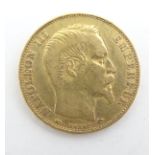 A French Republic 20 franc gold coin, 1857 Napoleon III, approximately 6.5g Please Note - we do