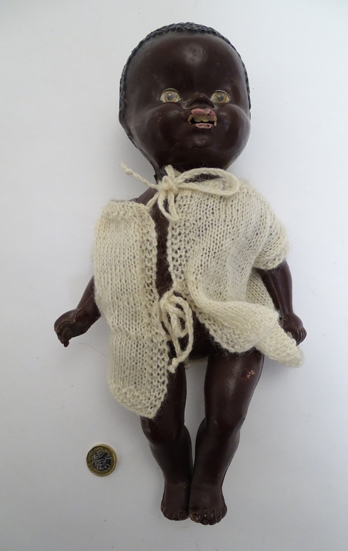 Toy: A black composite doll with articulated head, arms and legs, with modelled hair and painted - Image 4 of 7