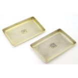 A pair of silver gilt dressing table dishes with engine turned decoration. Hallmarked Birmingham