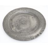An 18thC pewter circular plate, the reverse with touchmarks for Burgum & Catcott, Bristol &