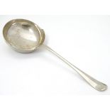 A silver Hanoverian serving ladle hallmarked Sheffield 1965 maker Roberts & Belk Ltd. 9" long (128g)