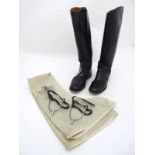 A pair of Harry Hall black leather Regent riding boots, size 9, with a zip carry and associated