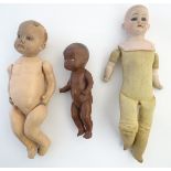 Toys: Three early c1900 dolls, to include an Ernst Heubach doll with a bisque head and shoulders and