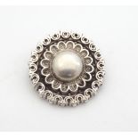 A Victorian silver brooch of circular form hallmarked Birmingham 1882. 1 1/4" diameter Please Note -