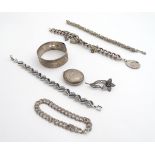 Assorted silver and white metal jewellery comprising bracelets, brooch, locket etc (102g) Please