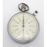 A mid / late 20thC Chromium cased Lemania twelve hour, time elapsed stopwatch. Engraved 'B.B.C 2226'
