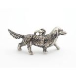 A Victorian Novelty Continental silver pendant / charm formed as a Dachshund / hunting dog. Probably